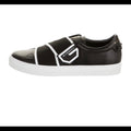 Givenchy leather slip-on sneakers.Round toes. Velcro closure at uppers.